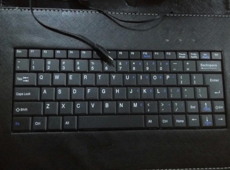 皮套加键盘说明书_手机皮套键盘详细说明_手机键盘皮套使用教程
