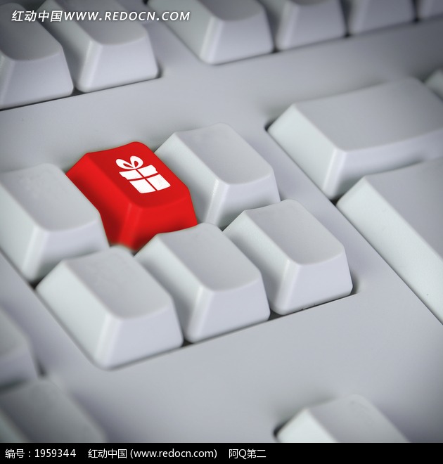 白色电脑键盘中间的红色按键